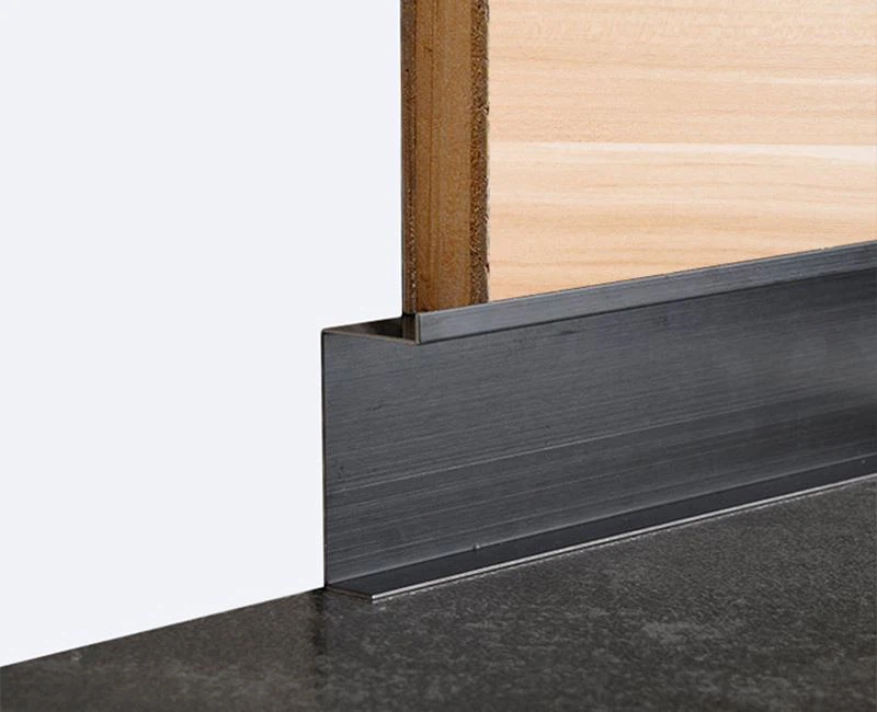 6. stainless skirting board on stone wall